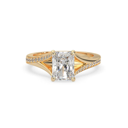 yellow Gold ring with a diamond on a white background