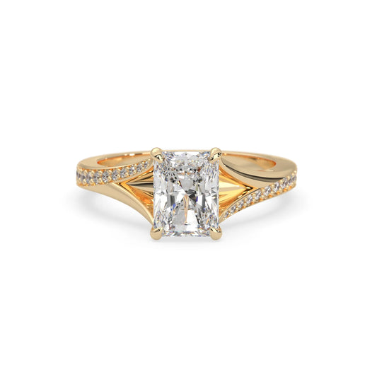 yellow Gold ring with a diamond on a white background