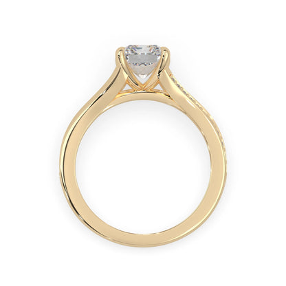 yellow Gold ring with a lab grown  diamond on a white background