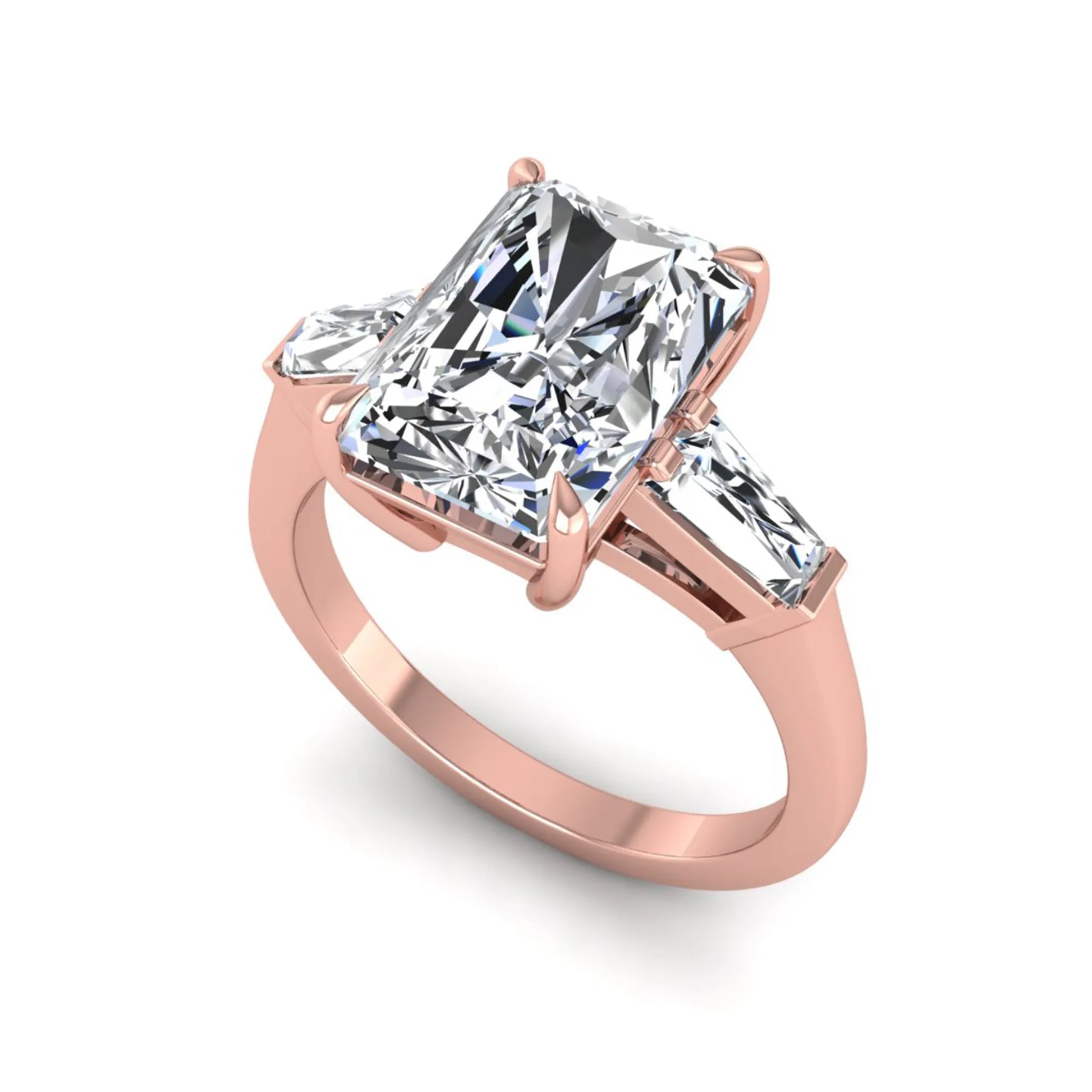 Radiant cut lab grown diamond three stone engagement ring with tapered baguette side diamonds and four prong setting in rose gold tone.