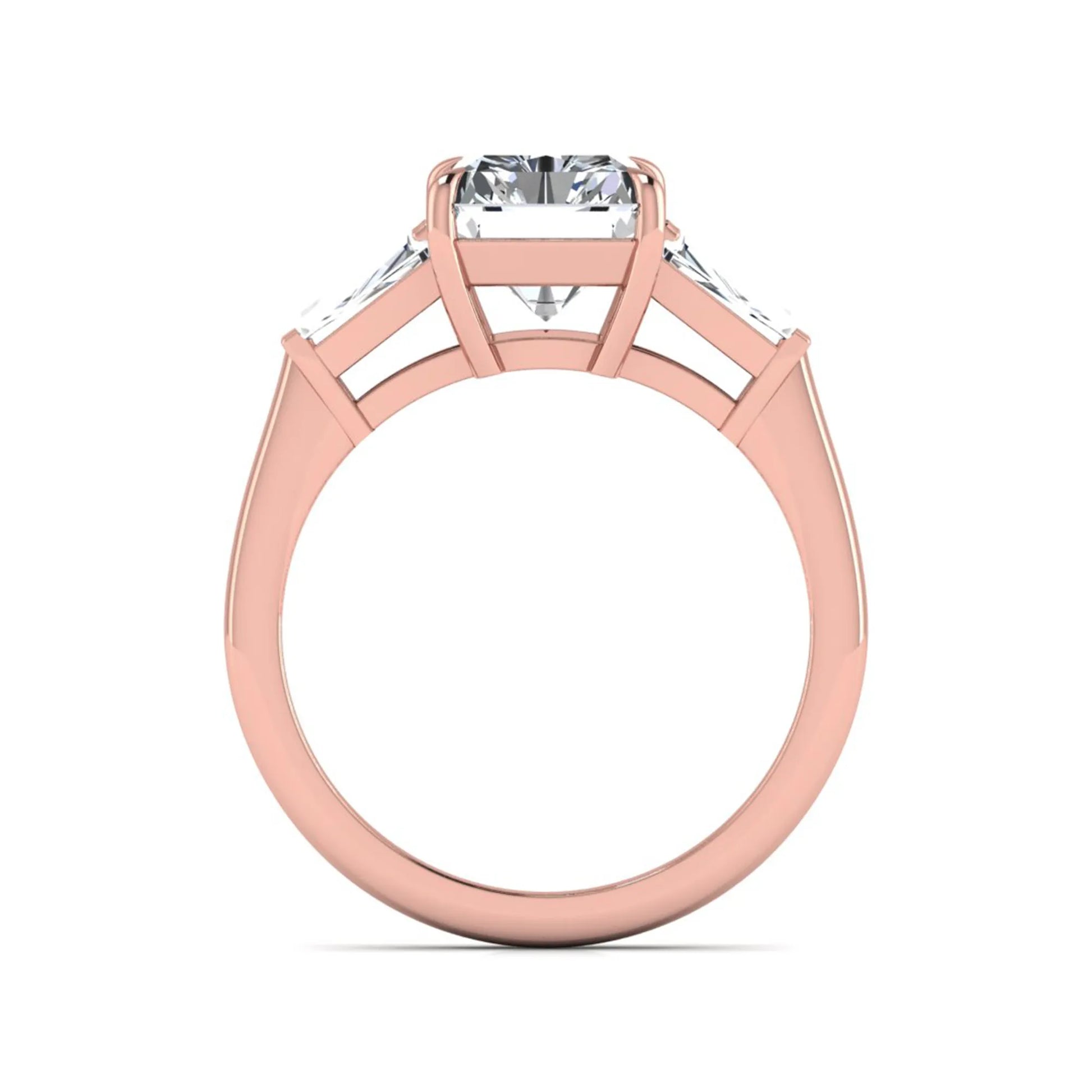 Radiant cut lab grown diamond three stone engagement ring with tapered baguette side diamonds and four prong setting in rose gold tone.
