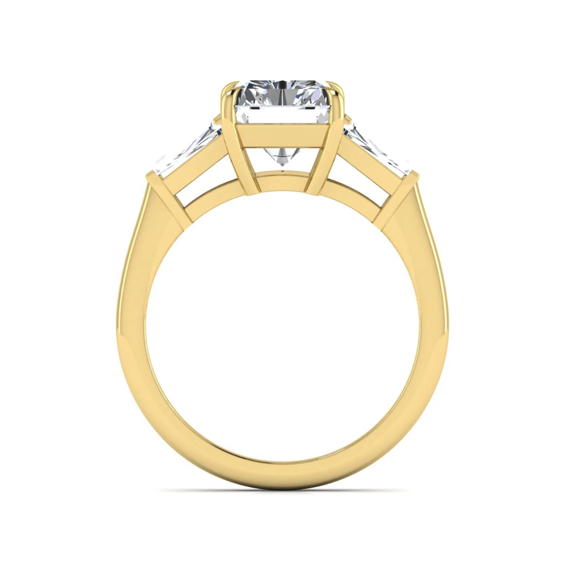 Radiant cut lab grown diamond three stone engagement ring with tapered baguette side diamonds and four prong setting in yellow gold tone.