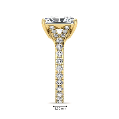 Radiant cut lab grown diamond split shank engagement ring with round accent diamonds in yellow gold