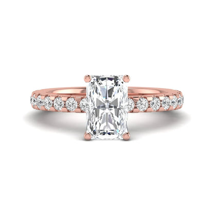 Radiant cut lab grown diamond hidden halo engagement ring featuring a four prong setting with pavé round diamond band in rose gold tone.