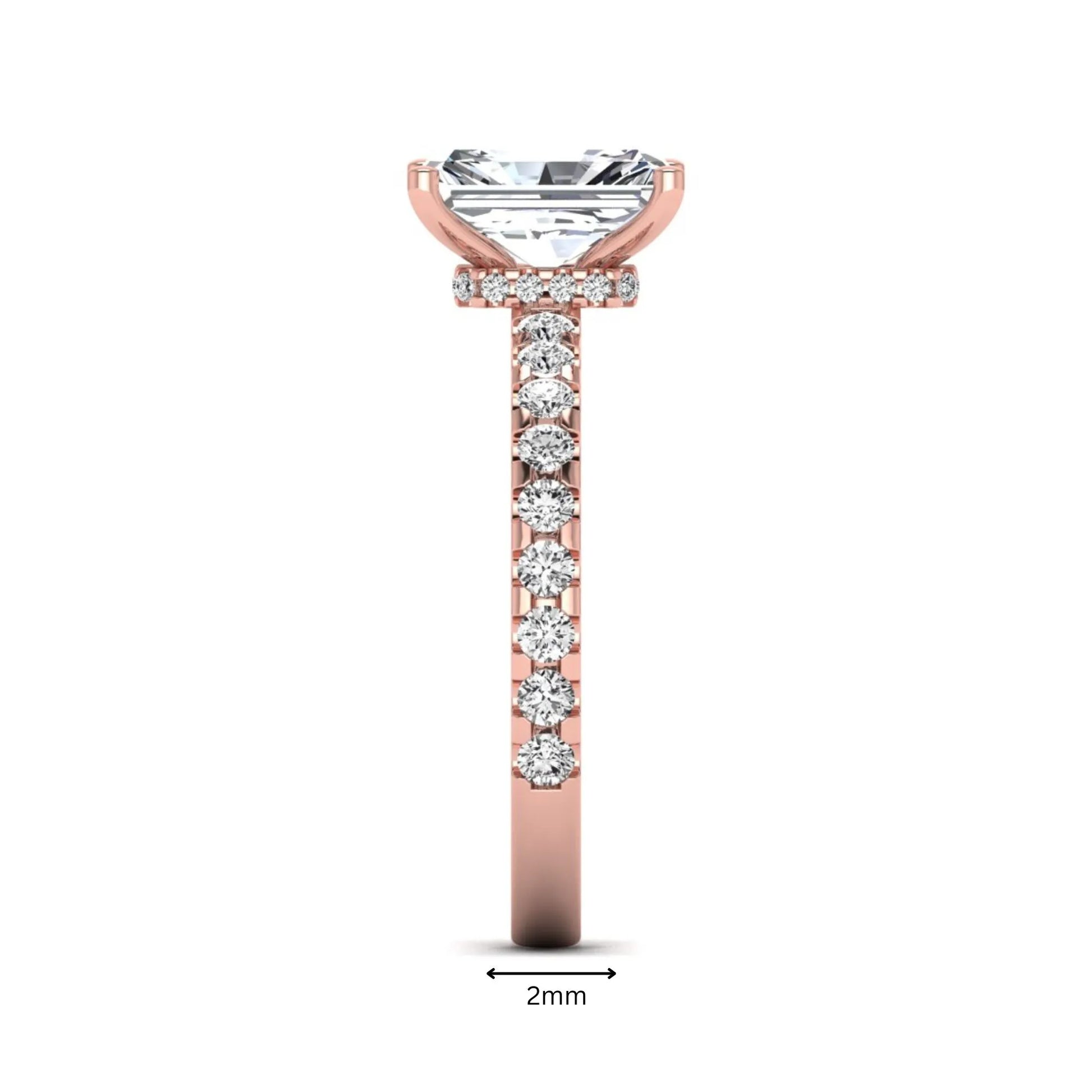 Radiant cut lab grown diamond hidden halo engagement ring featuring a four prong setting with pavé round diamond band in rose gold tone.