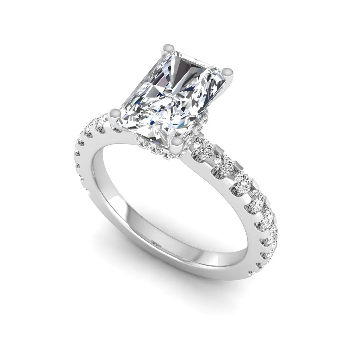 Radiant cut lab grown diamond hidden halo engagement ring featuring a four prong setting with pavé round diamond band in white gold tone.