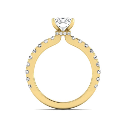 Radiant cut lab grown diamond hidden halo engagement ring featuring a four prong setting with pavé round diamond band in yellow gold tone.