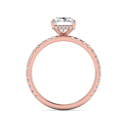 Radiant cut lab grown diamond hidden halo engagement ring featuring a four prong setting, pavé round diamonds, and rose gold tone design.