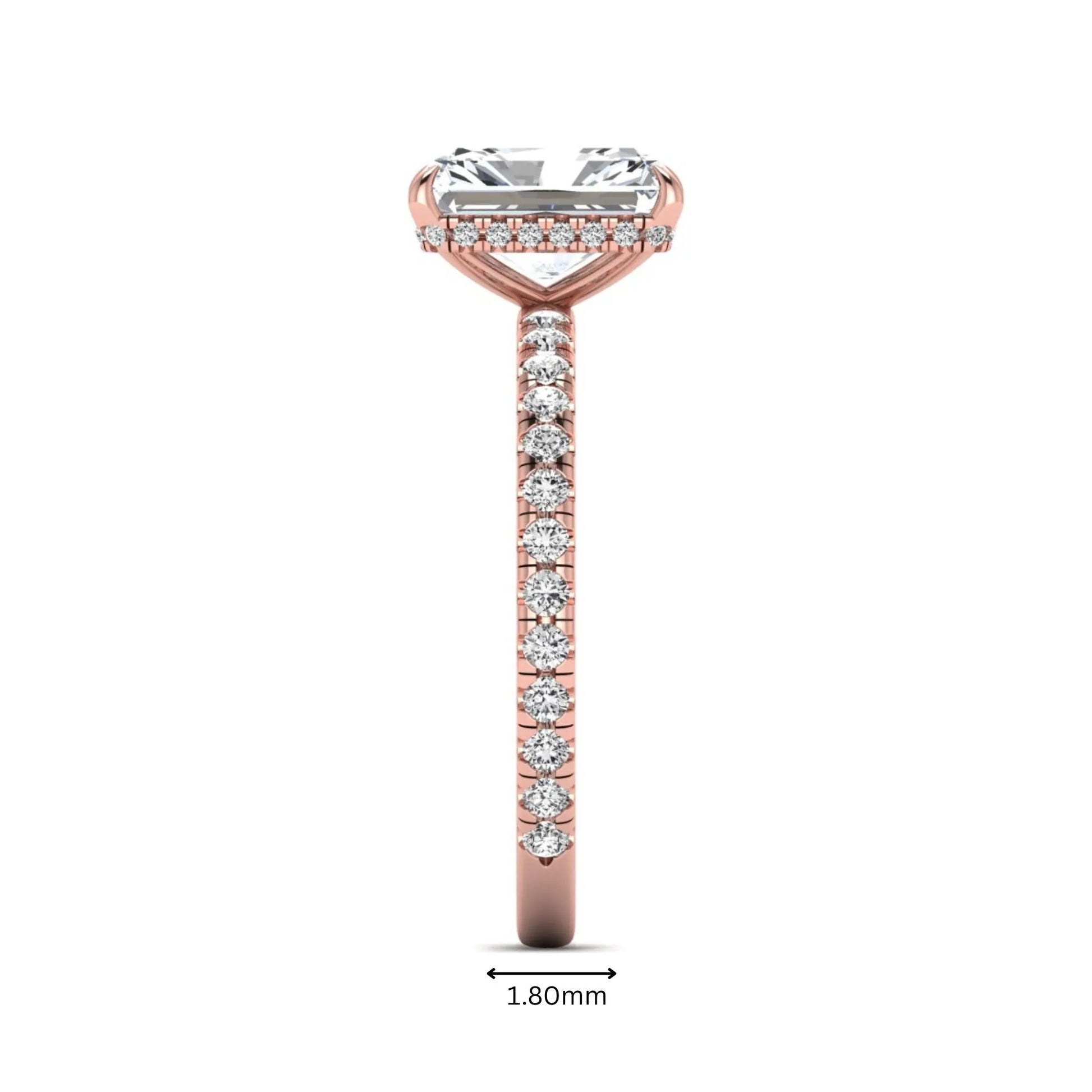 Radiant cut lab grown diamond hidden halo engagement ring featuring a four prong setting, pavé round diamonds, and rose gold tone design.