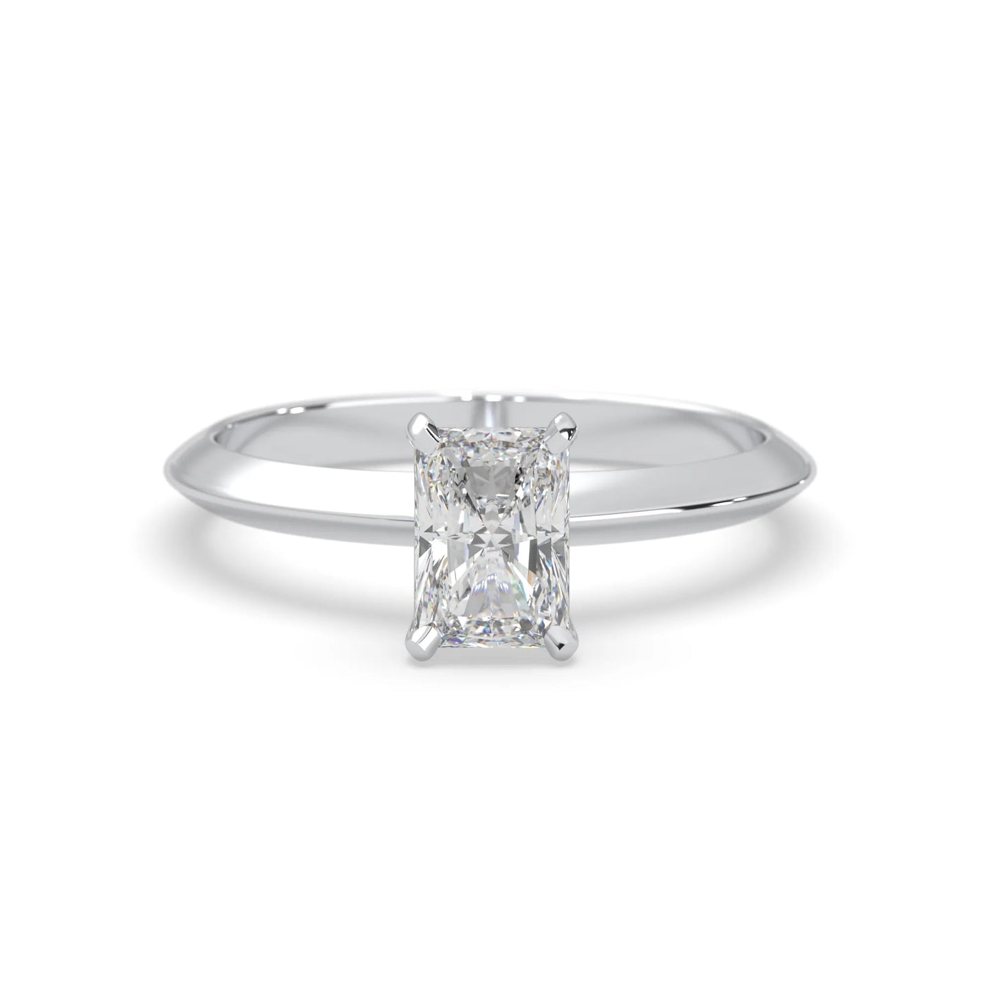 white-gold Diamond ring with a rectangular cut gemstone on a white background