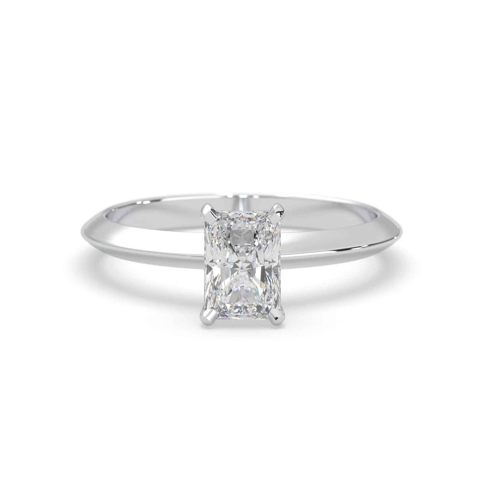white-gold Diamond ring with a rectangular cut gemstone on a white background