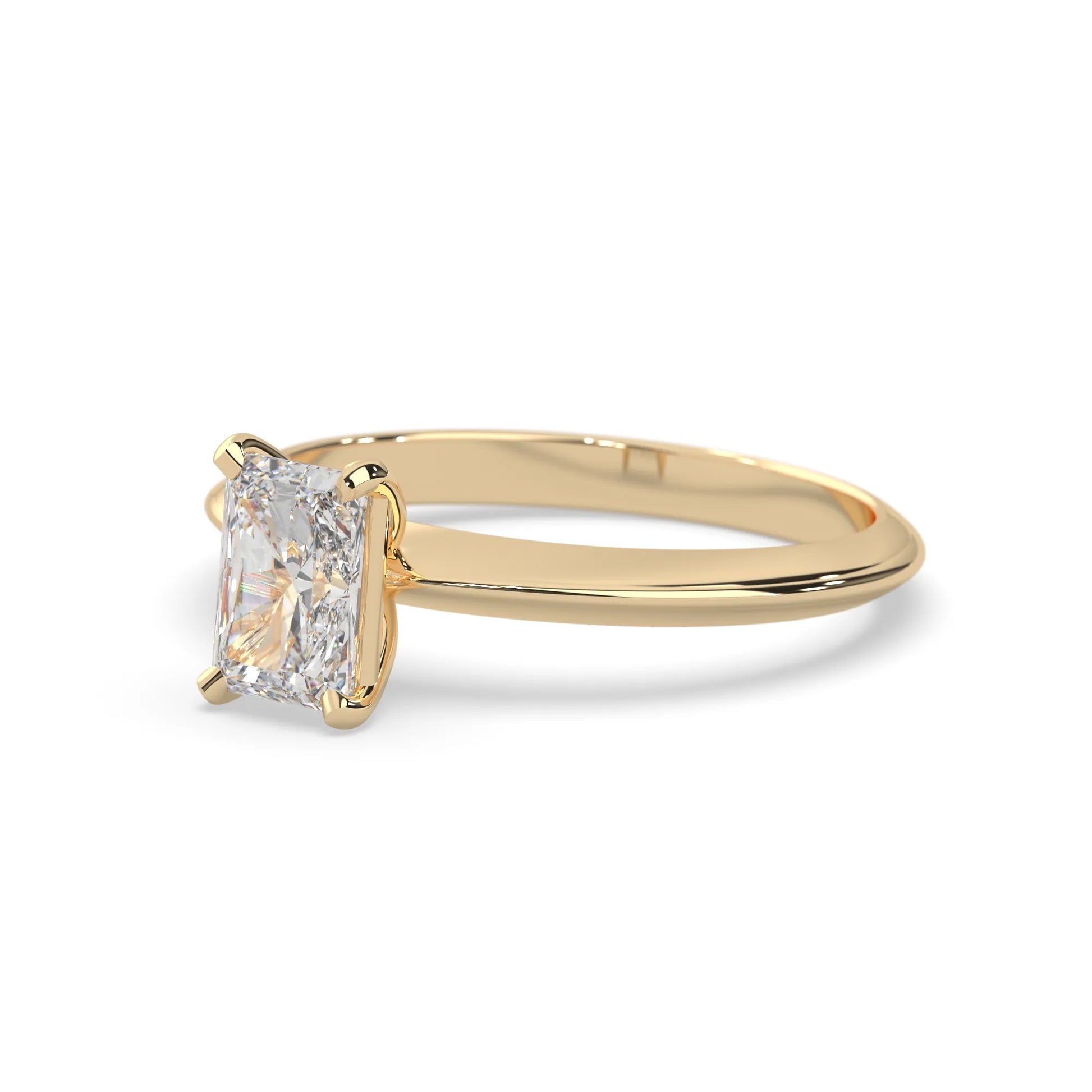 yellow-Gold ring with a large diamond on a white background
