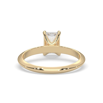 yellow-Gold ring with a diamond on a white background