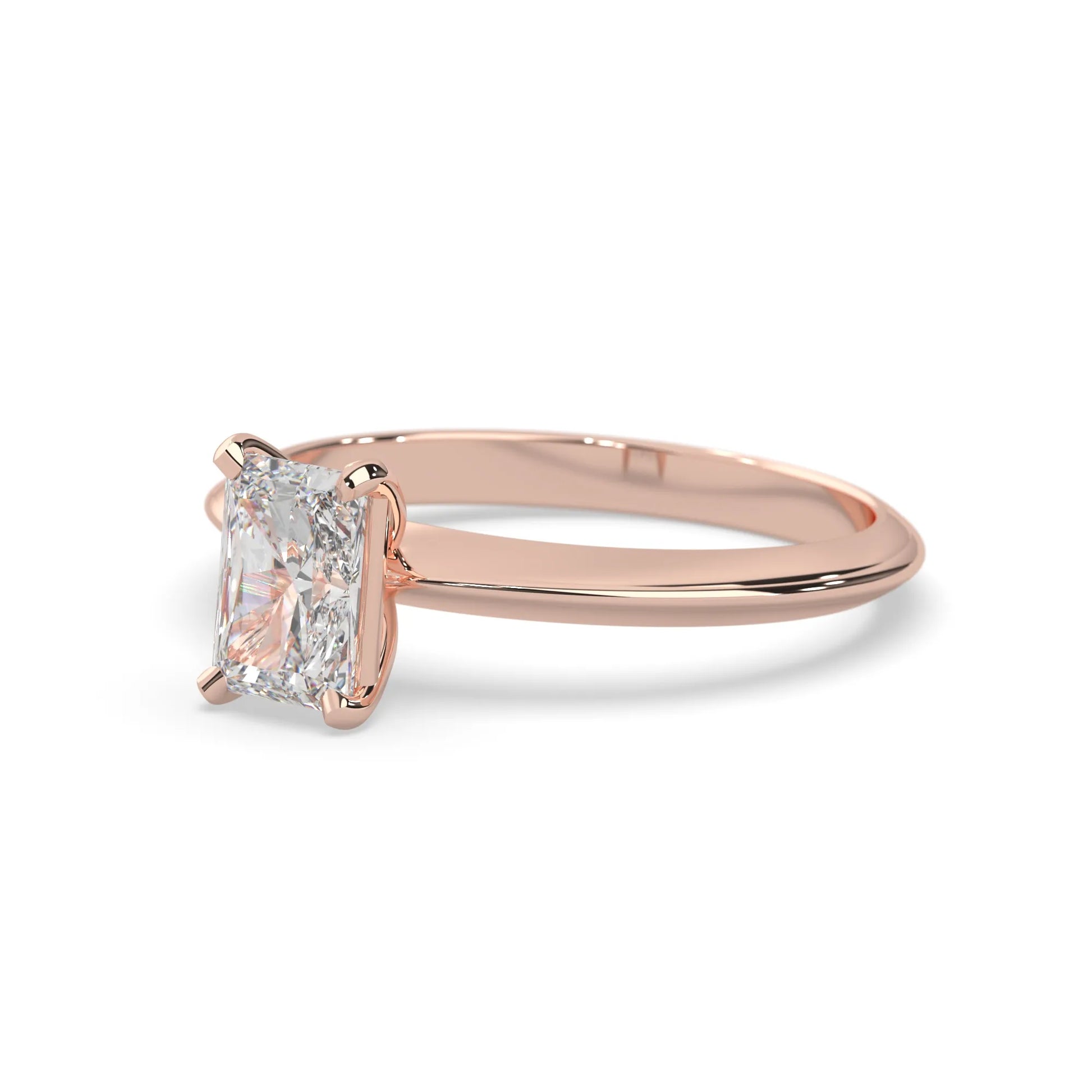 Rose-gold ring with a diamond on a white background