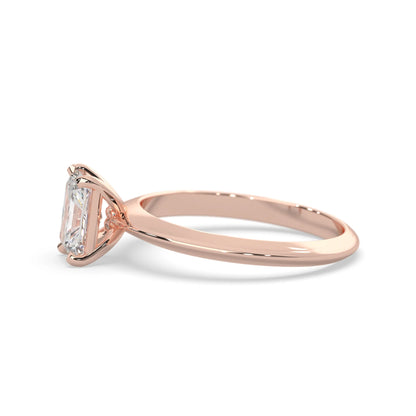 Rose-gold ring with a diamond on a white background