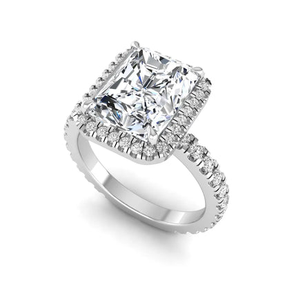 Radiant cut lab grown diamond halo engagement ring with pavé round diamonds in white gold setting