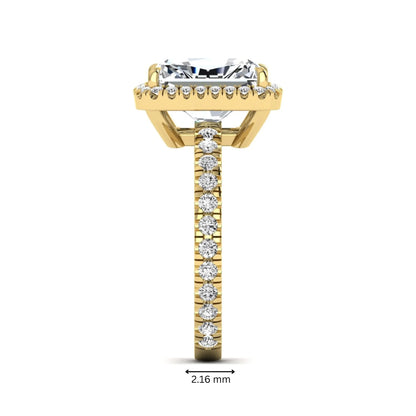 Radiant cut lab grown diamond halo engagement ring with pavé round diamonds in yellow gold setting