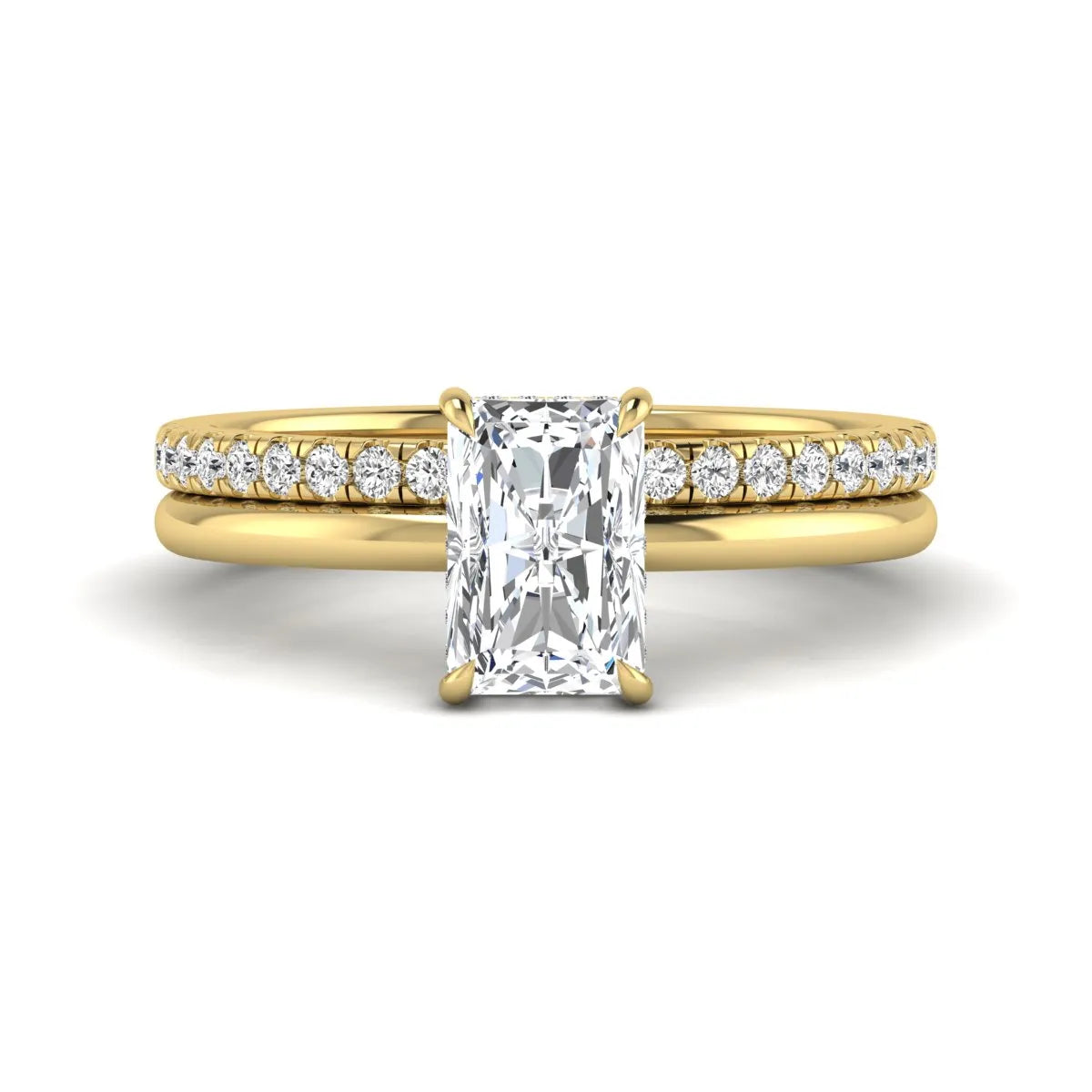 Radiant cut lab grown diamond hidden halo engagement ring with pavé matching wedding band in a yellow gold setting