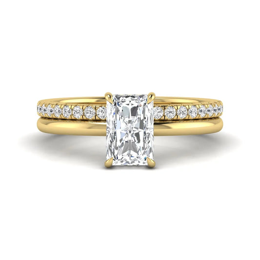 Radiant cut lab grown diamond hidden halo engagement ring with pavé matching wedding band in a yellow gold setting