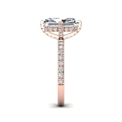 Rose-gold ring with a diamond band on a white background