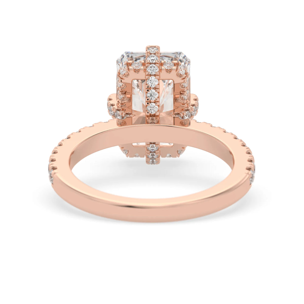 Rose-gold ring with a large diamond and smaller diamonds on the band against a white background