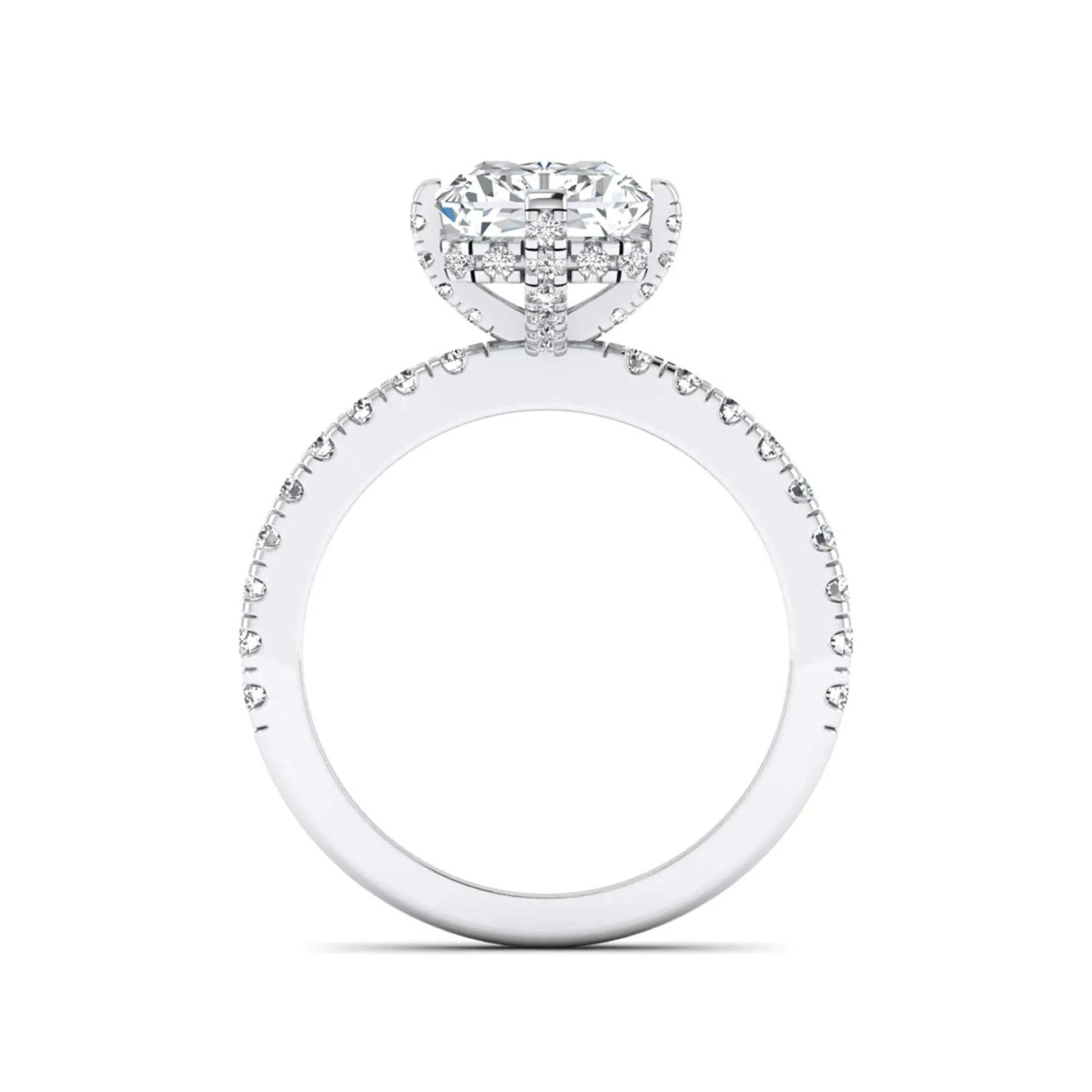 white-gold Diamond ring with a heart-shaped center stone on a white background