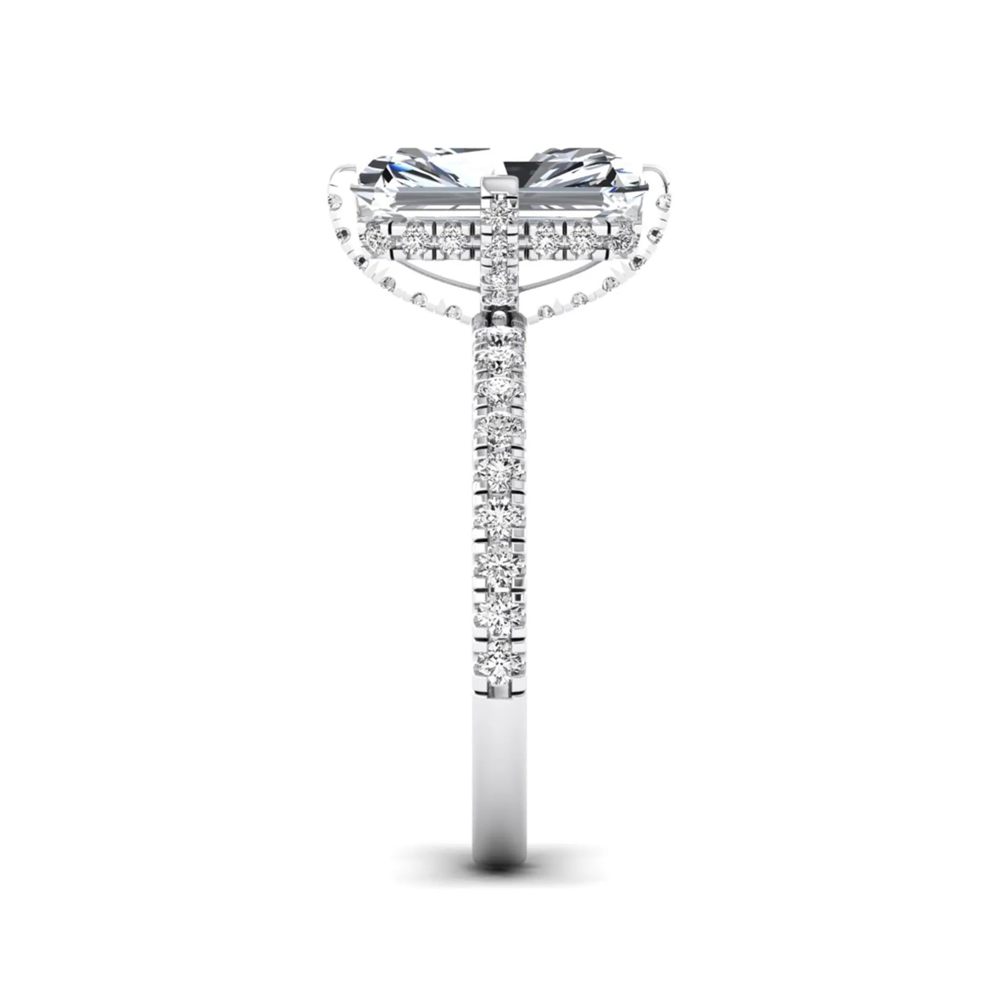 white-gold Diamond ring with a central emerald-cut stone and smaller diamonds on a white background