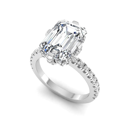 IGI Certified 3.81 carat radiant cut lab grown diamond engagement ring with hidden halo and round side stone accents in white gold.