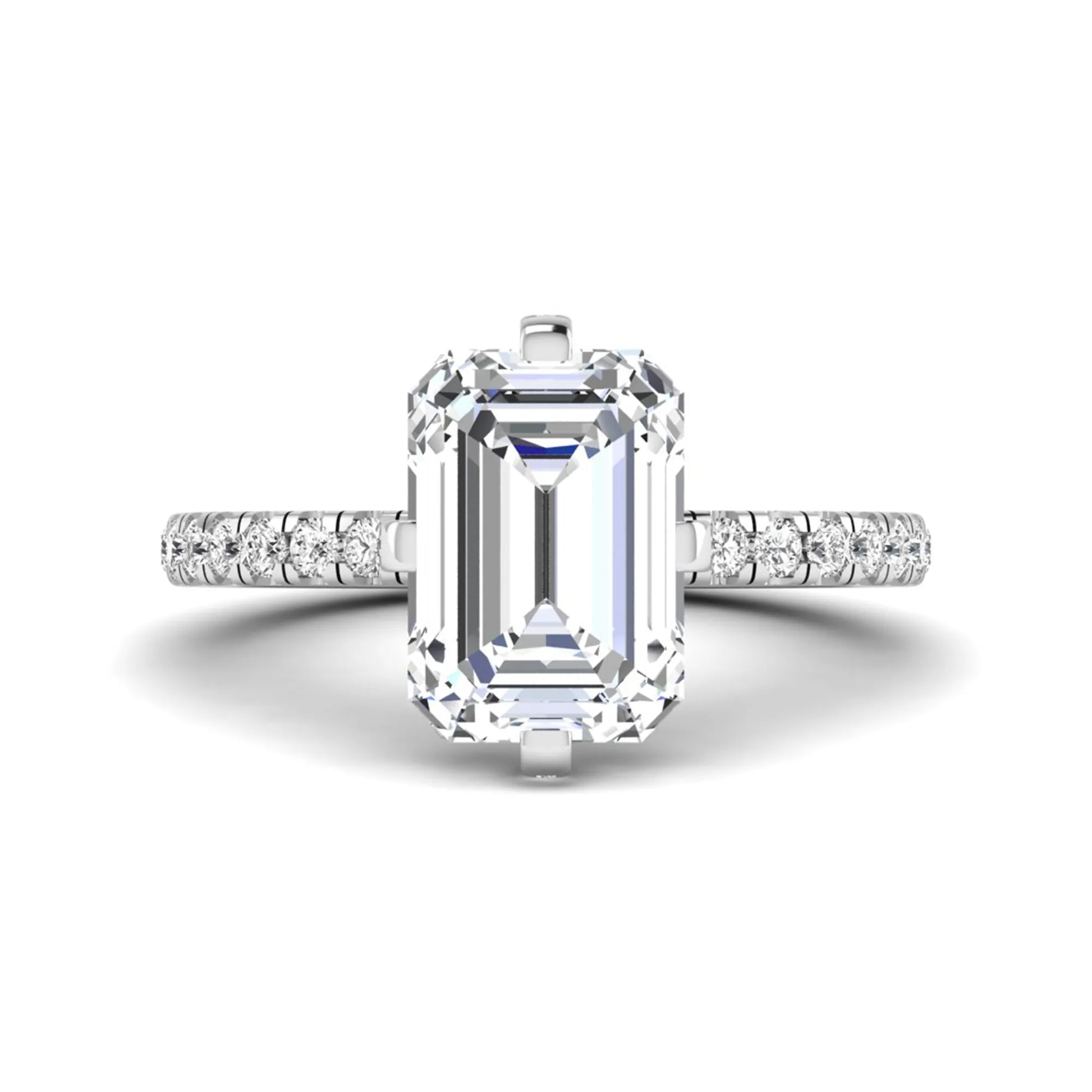 IGI Certified 3.81 carat radiant cut lab grown diamond engagement ring with hidden halo and round side stone accents in white gold.