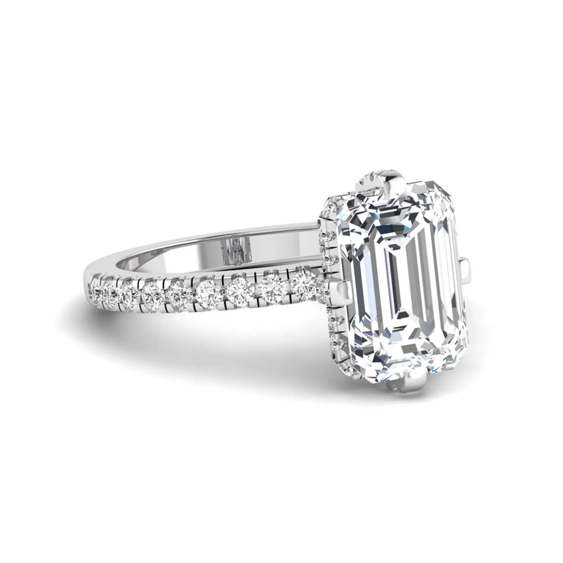 IGI Certified 3.81 carat radiant cut lab grown diamond engagement ring with hidden halo and round side stone accents in white gold.