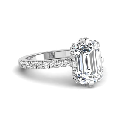 IGI Certified 3.81 carat radiant cut lab grown diamond engagement ring with hidden halo and round side stone accents in white gold.