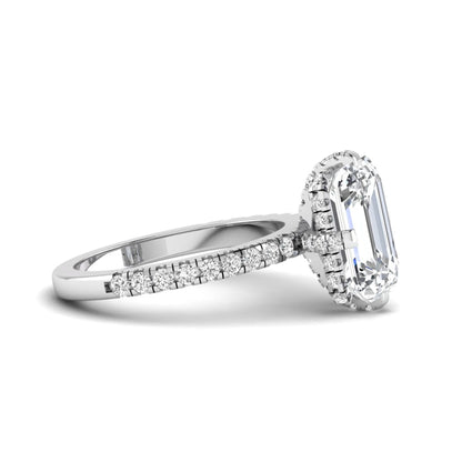IGI Certified 3.81 carat radiant cut lab grown diamond engagement ring with hidden halo and round side stone accents in white gold.