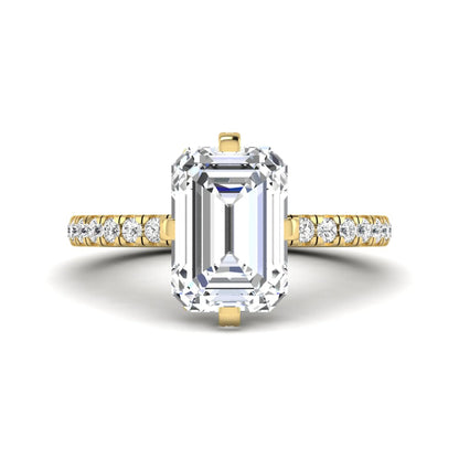 IGI Certified 3.81 carat radiant cut lab grown diamond engagement ring with hidden halo and round side stone accents in yellow gold.