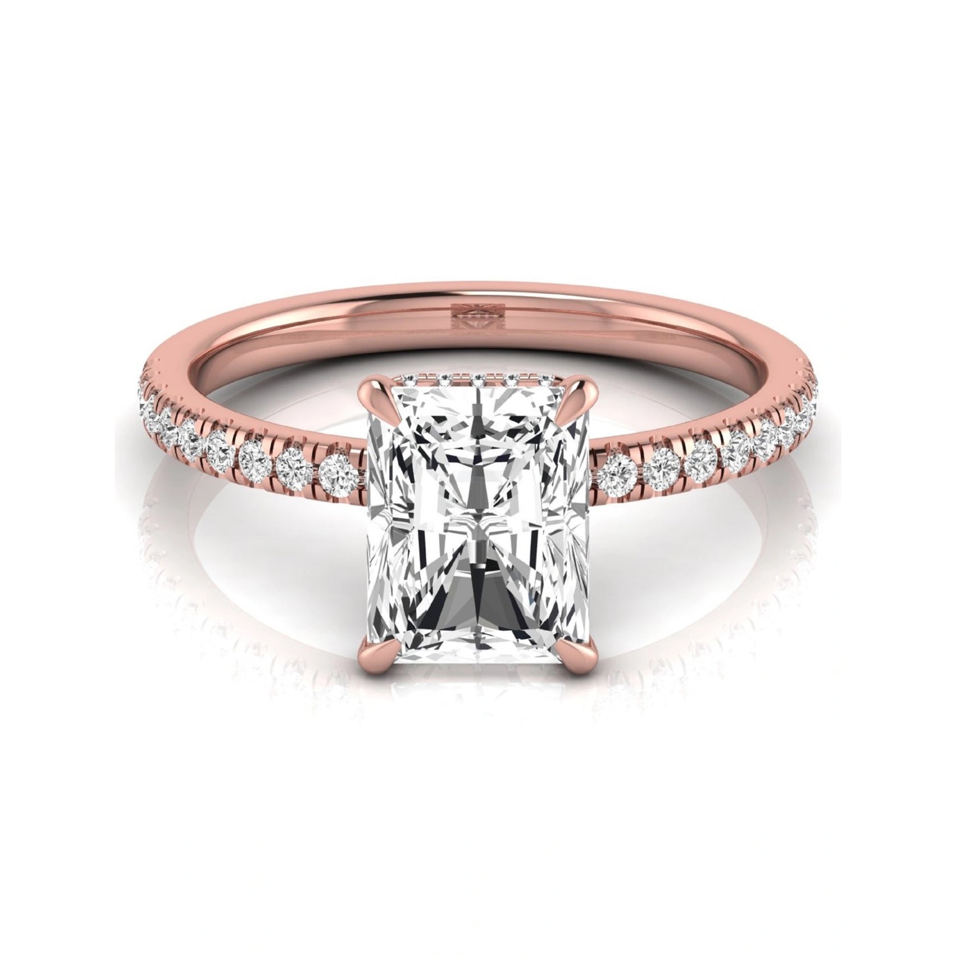 Radiant cut lab grown diamond engagement ring with hidden halo, pavé side diamonds, and four-prong setting in rose gold style.