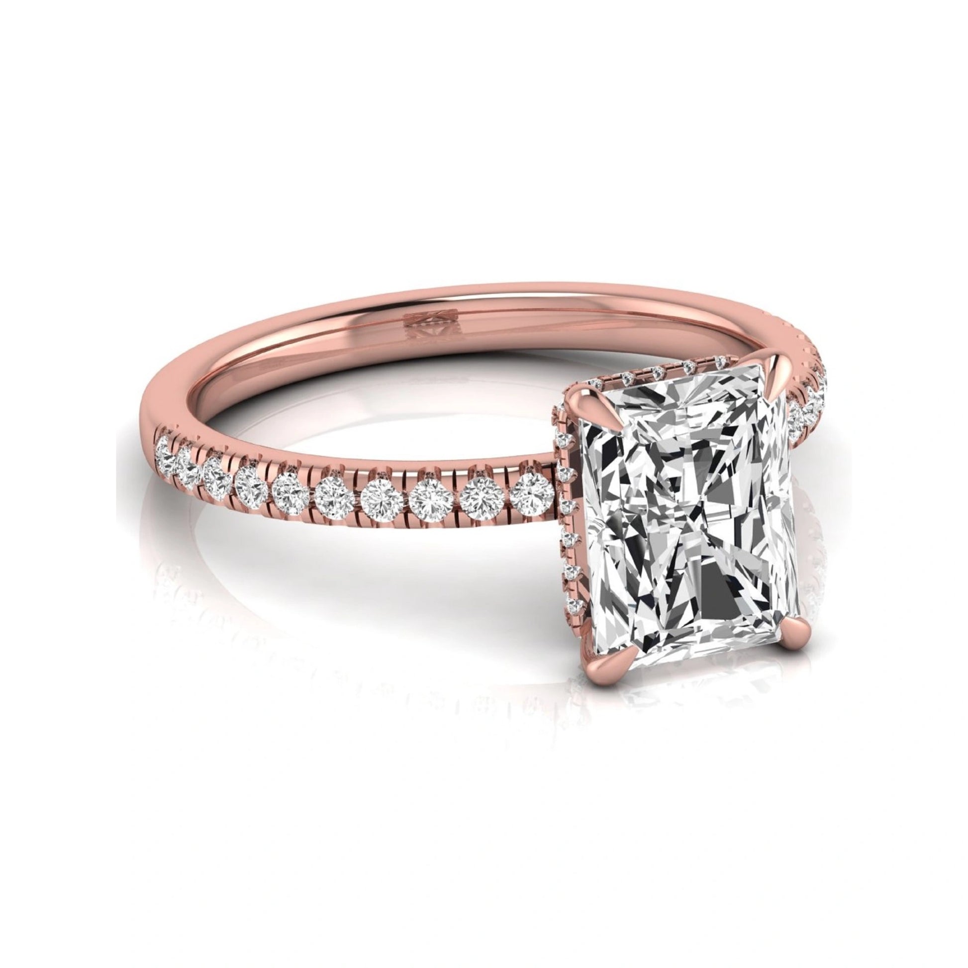 Radiant cut lab grown diamond engagement ring with hidden halo, pavé side diamonds, and four-prong setting in rose gold style.