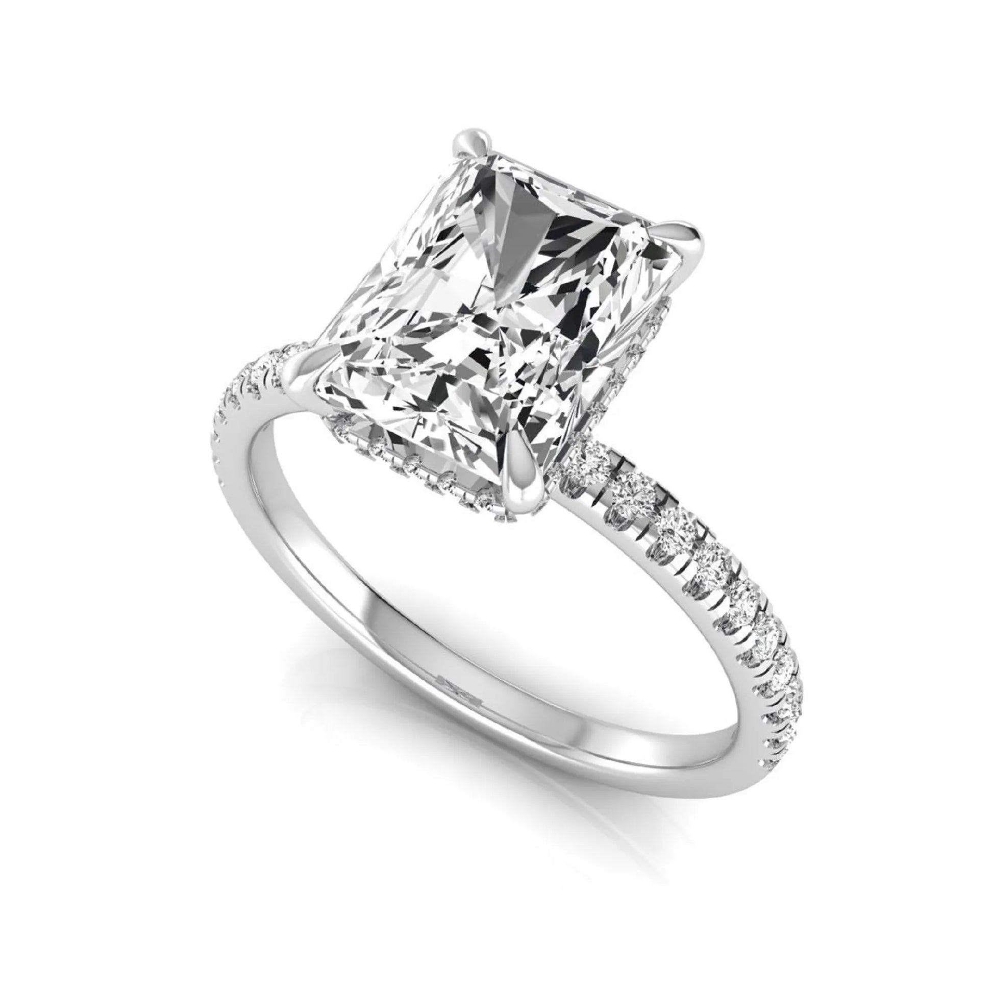 Radiant cut lab grown diamond engagement ring with hidden halo, pavé side diamonds, and four-prong setting in white gold style.