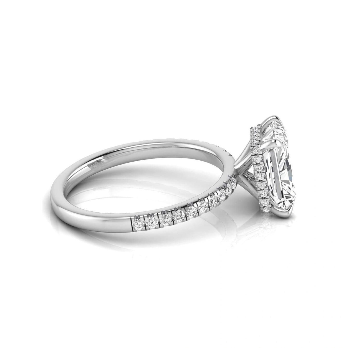 Radiant cut lab grown diamond engagement ring with hidden halo, pavé side diamonds, and four-prong setting in white gold style.