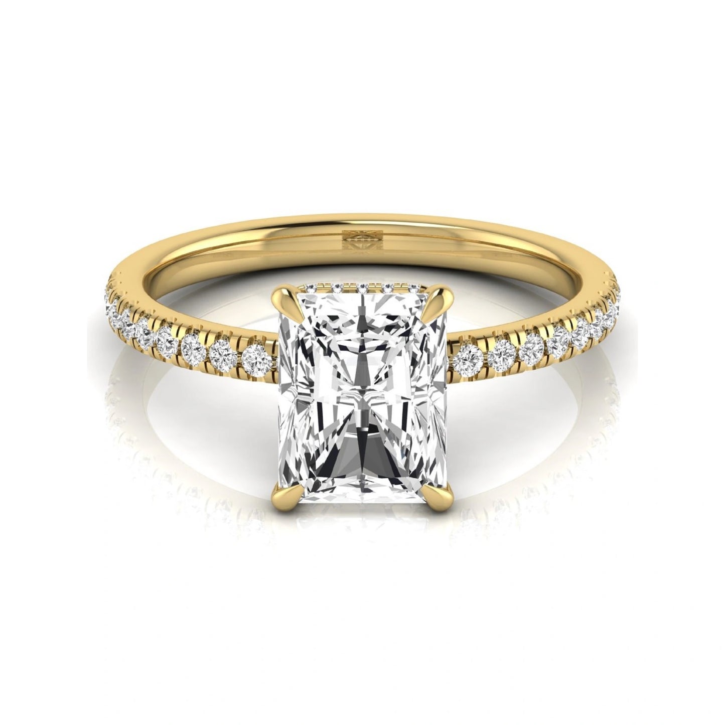 Radiant cut lab grown diamond engagement ring with hidden halo, pavé side diamonds, and four-prong setting in yellow gold style.