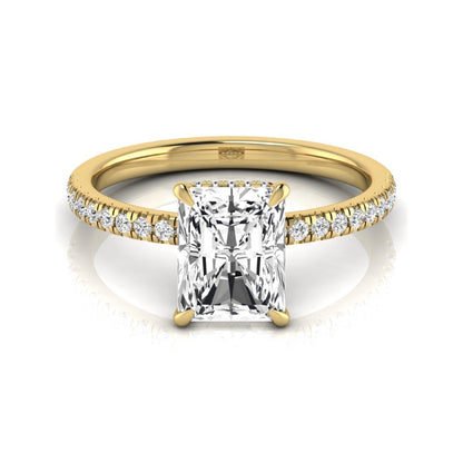 Radiant cut lab grown diamond engagement ring with hidden halo, pavé side diamonds, and four-prong setting in yellow gold style.