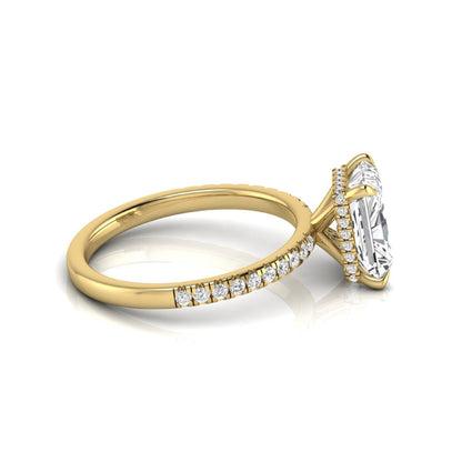 Radiant cut lab grown diamond engagement ring with hidden halo, pavé side diamonds, and four-prong setting in yellow gold style.