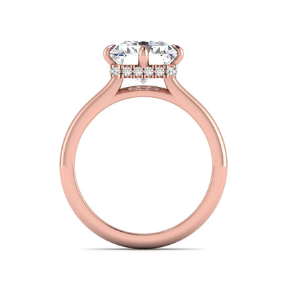 Radiant cut lab grown diamond hidden halo solitaire engagement ring with a four-prong setting and polished rose gold band.