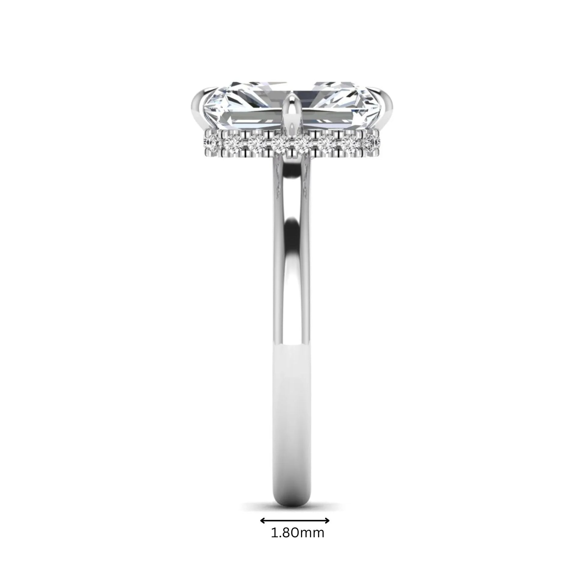 Radiant cut lab grown diamond hidden halo solitaire engagement ring with a four-prong setting and polished white gold band.