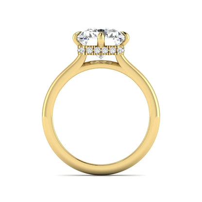 Radiant cut lab grown diamond hidden halo solitaire engagement ring with a four-prong setting and polished yellow gold band.