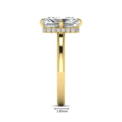Radiant cut lab grown diamond hidden halo solitaire engagement ring with a four-prong setting and polished yellow gold band.