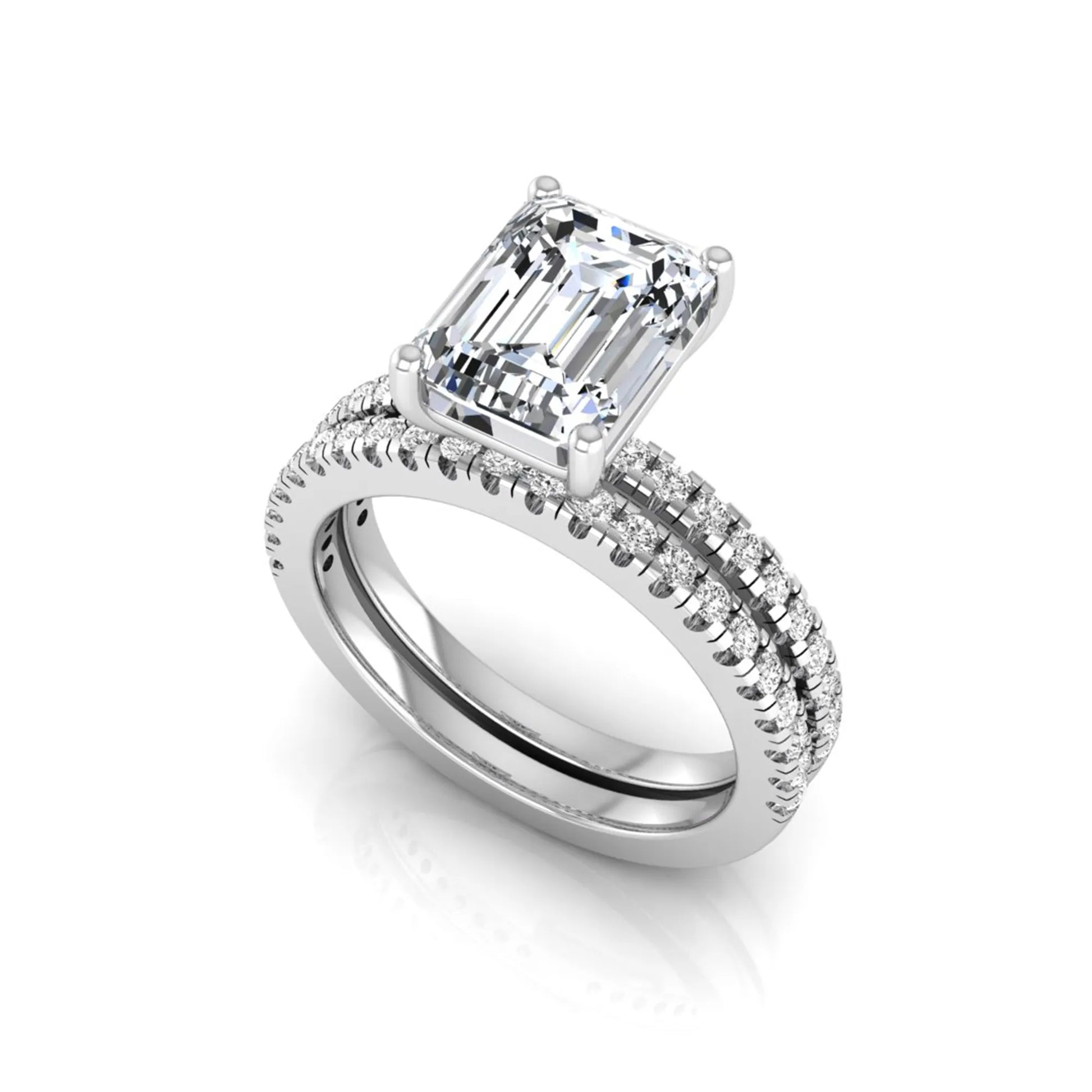 Radiant lab grown diamond double pavé bridal ring set featuring a 2.62 carat IGI certified radiant center diamond with matching pavé wedding band in white gold.