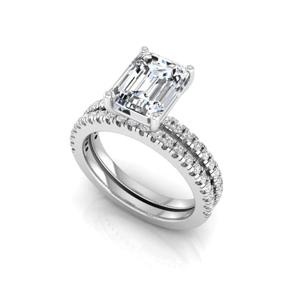 Radiant lab grown diamond double pavé bridal ring set featuring a 2.62 carat IGI certified radiant center diamond with matching pavé wedding band in white gold.