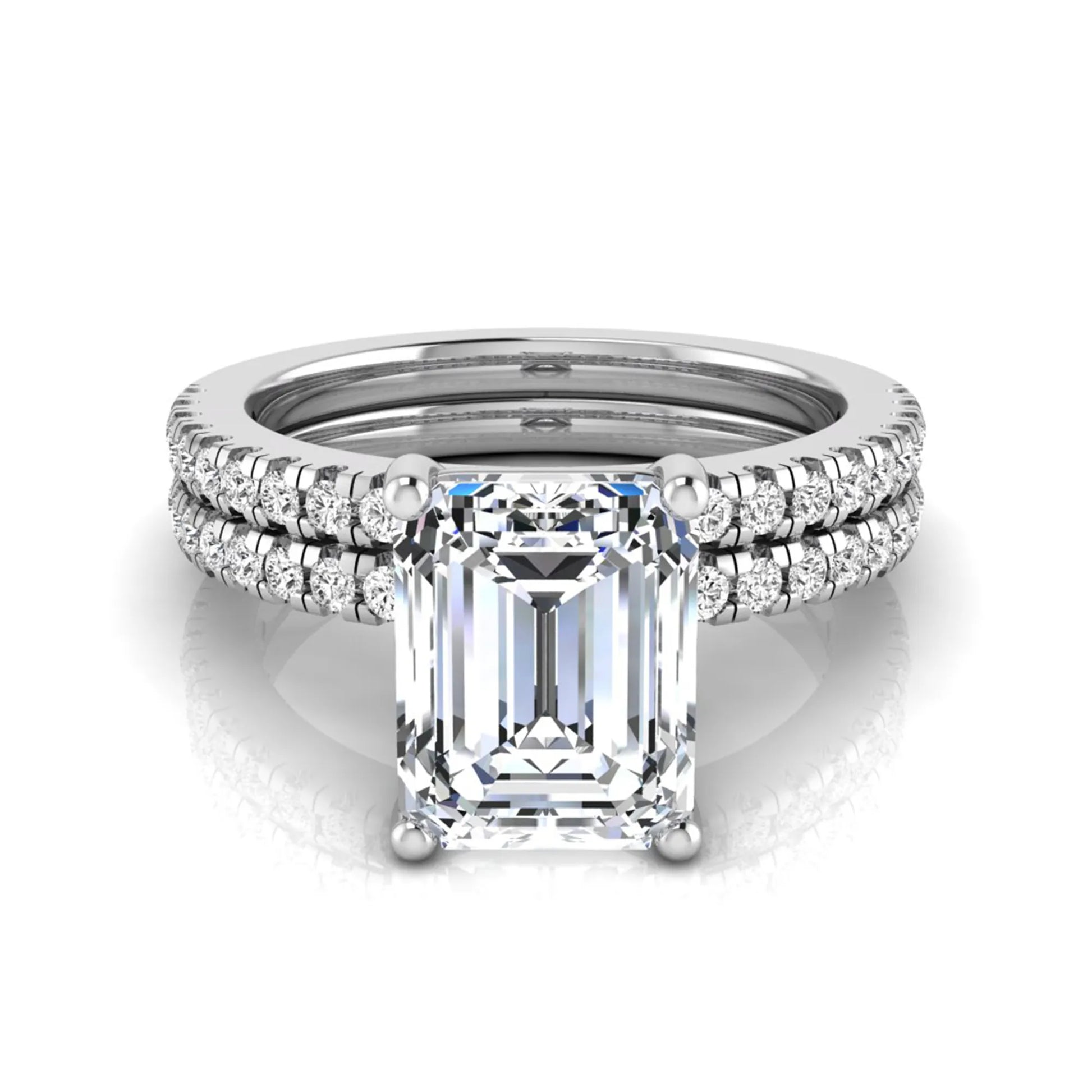 Radiant lab grown diamond double pavé bridal ring set featuring a 2.62 carat IGI certified radiant center diamond with matching pavé wedding band in white gold.
