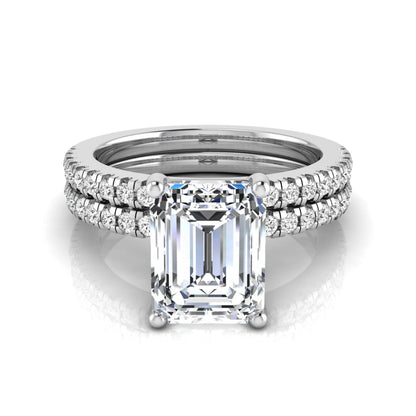 Radiant lab grown diamond double pavé bridal ring set featuring a 2.62 carat IGI certified radiant center diamond with matching pavé wedding band in white gold.
