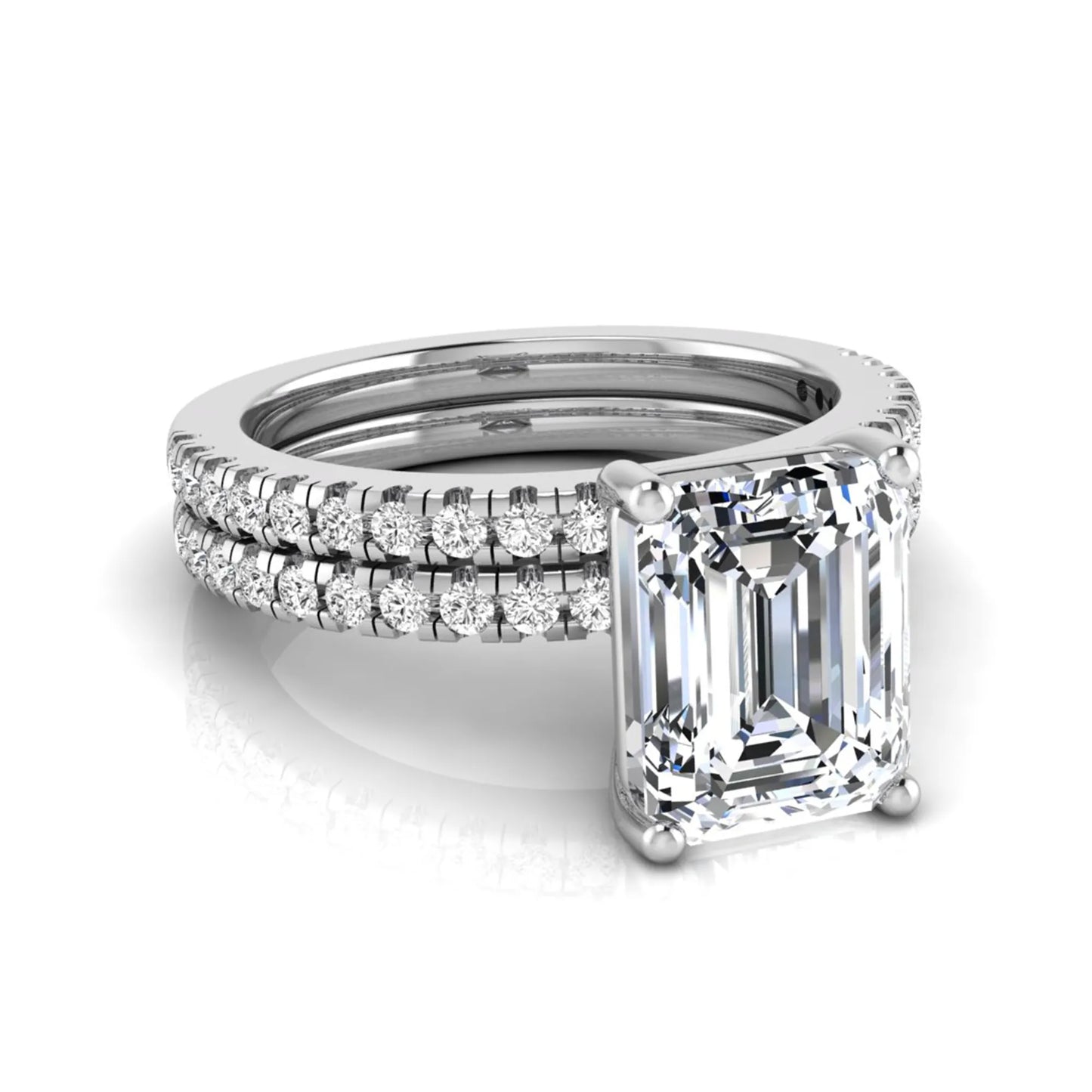 Radiant lab grown diamond double pavé bridal ring set featuring a 2.62 carat IGI certified radiant center diamond with matching pavé wedding band in white gold.