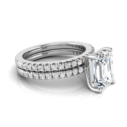 Radiant lab grown diamond double pavé bridal ring set featuring a 2.62 carat IGI certified radiant center diamond with matching pavé wedding band in white gold.
